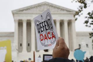 Sign supporting DACA in front of the Supreme Court
